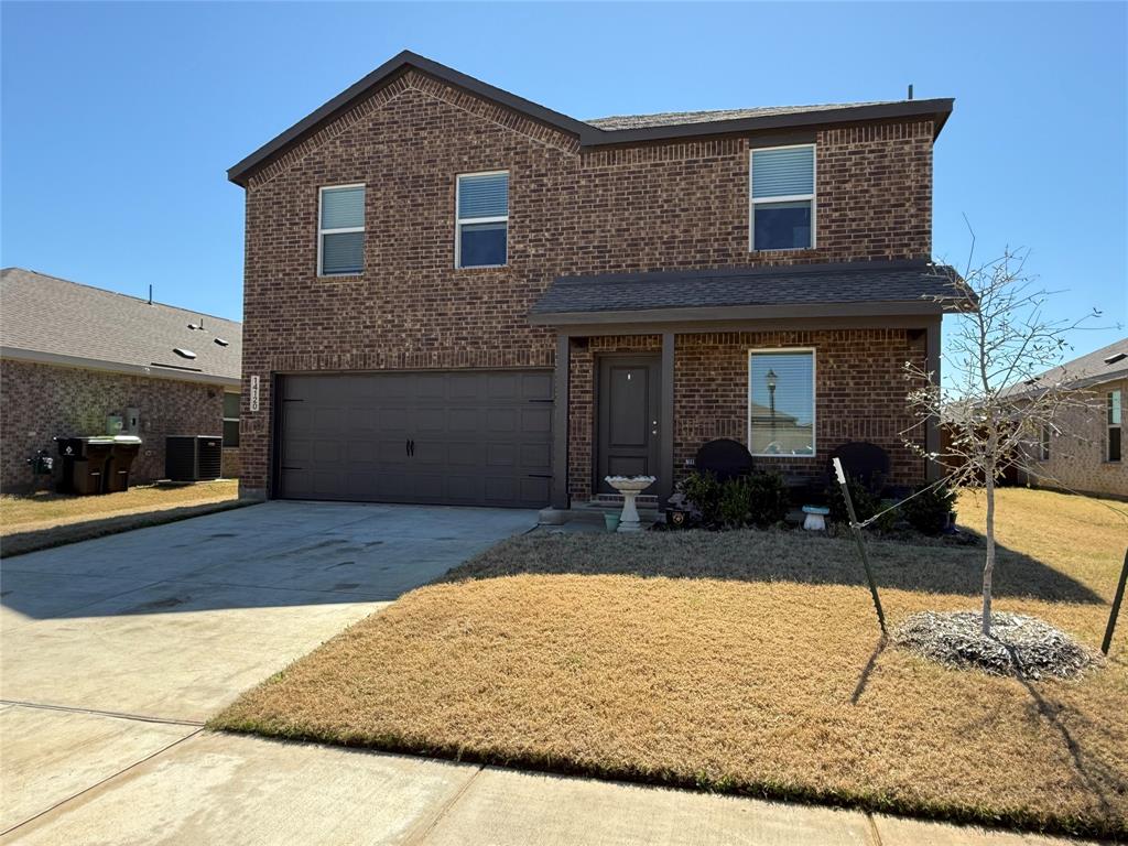 14120 Hammersmith Street Pilot Point, TX 76258 - Photo 12 of 12 a front view of a house with entertaining space