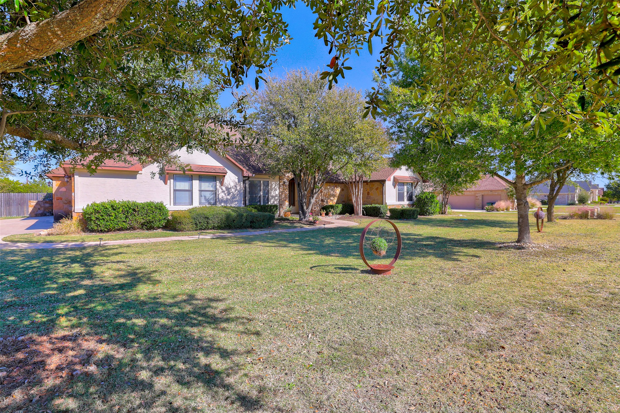 Undisclosed Address Georgetown, TX 78633 - Photo 9 of 39 Obstructed view of property featuring a front lawn