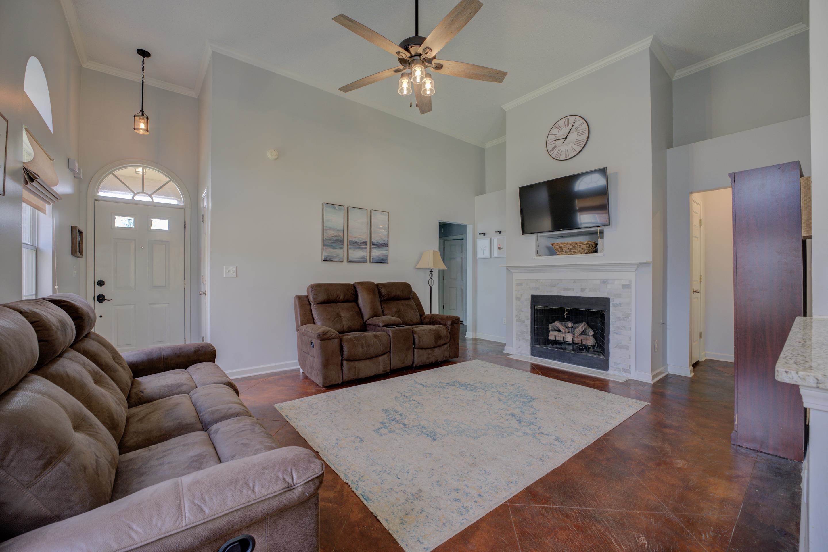 9696 Java Cove Memphis, TN 38002 - Photo 3 of 26 Snuggle up beside the cozy fireplace in the great room.