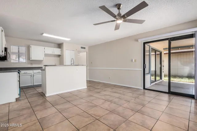 a kitchen with stainless steel appliances a refrigerator stove and sink