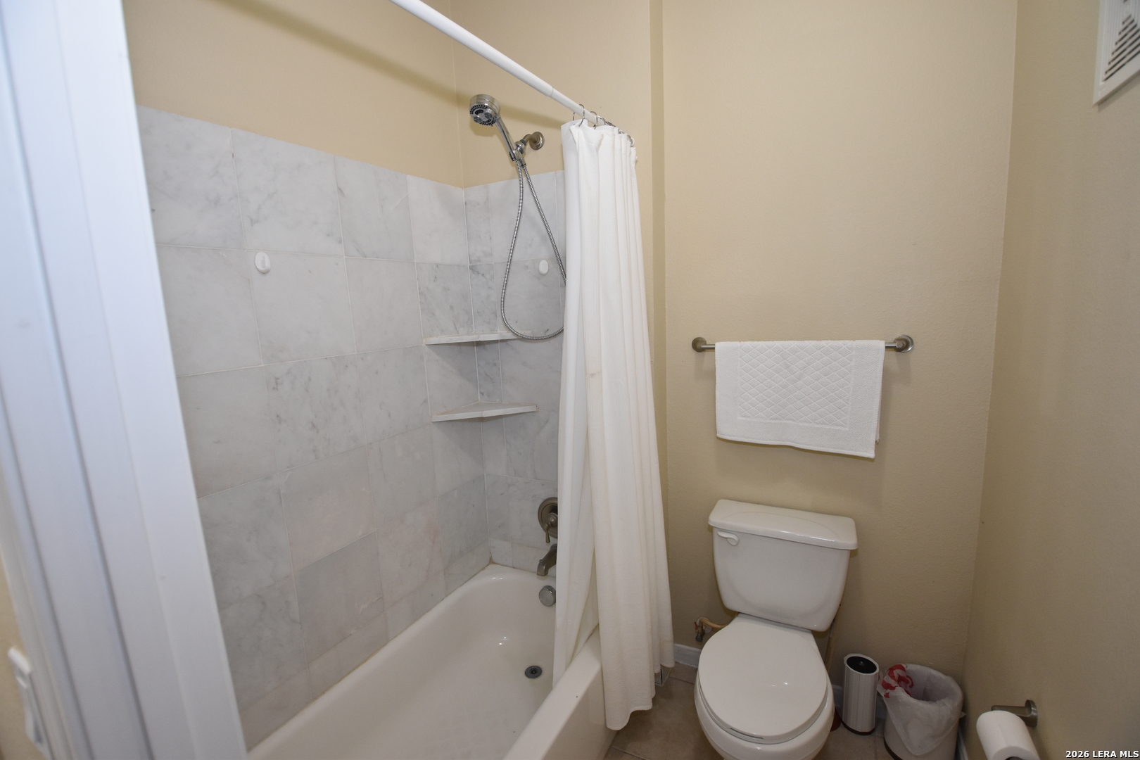 6160 Eckhert Road, Unit 804 San Antonio, TX 78240 - Photo 16 of 39 a white toilet sitting next to a bath tub