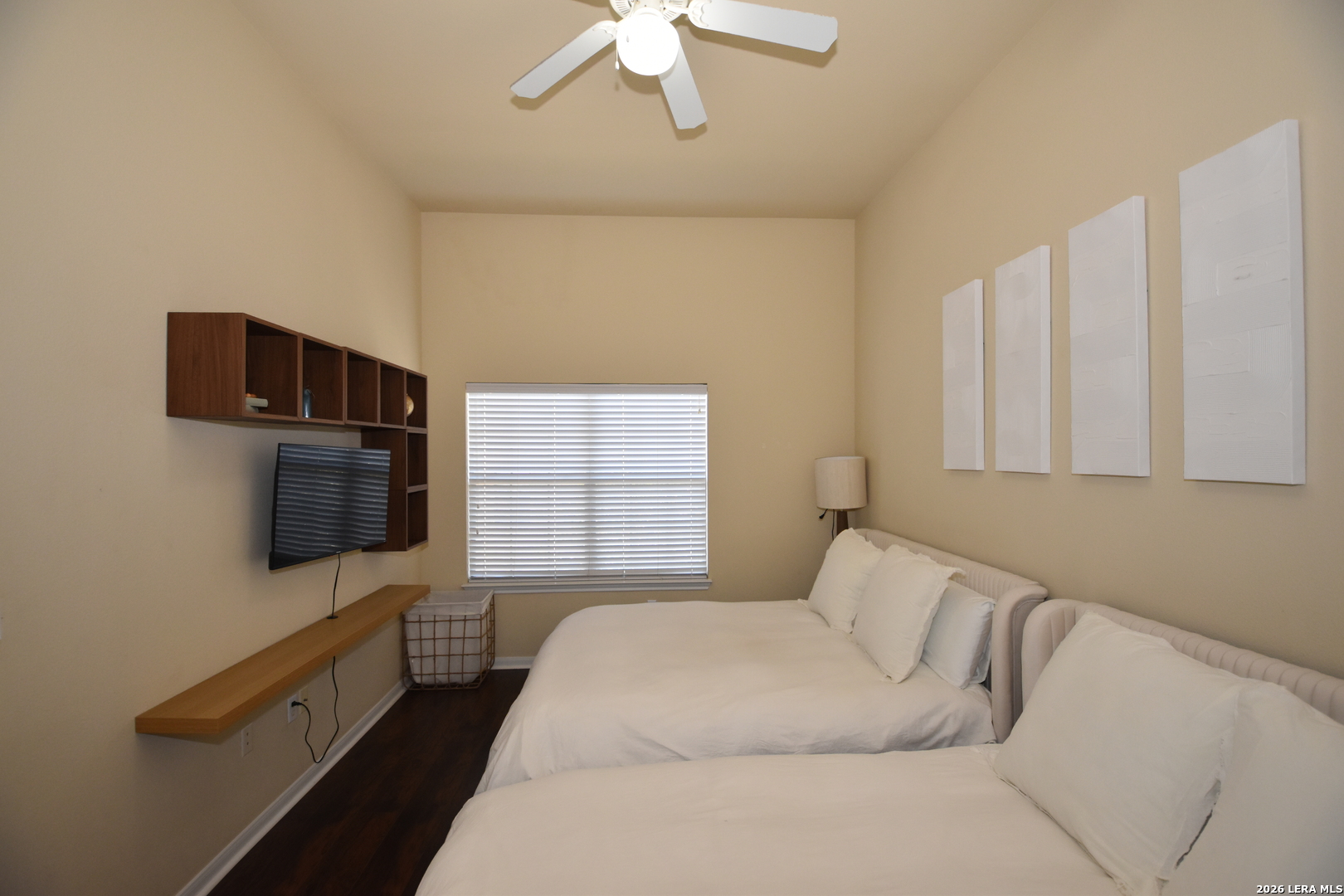 6160 Eckhert Road, Unit 804 San Antonio, TX 78240 - Photo 24 of 39 a bedroom with a bed and a flat screen tv