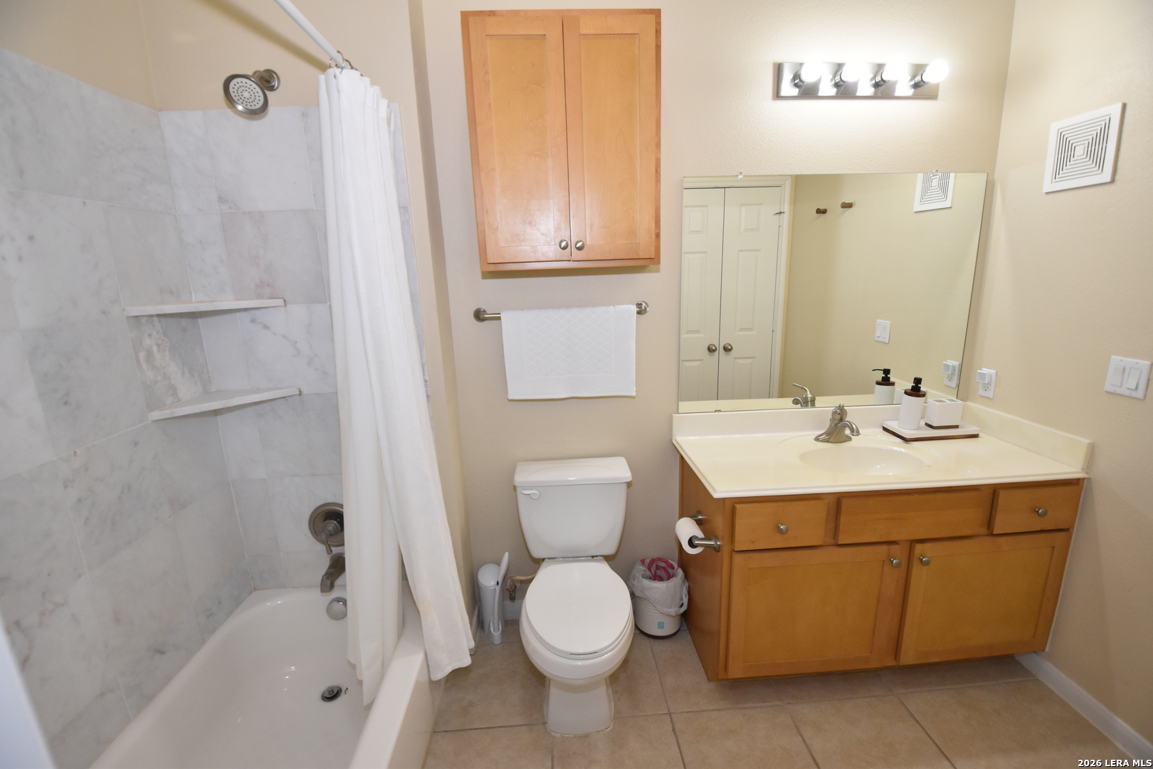 6160 Eckhert Road, Unit 804 San Antonio, TX 78240 - Photo 25 of 39 a bathroom with a sink toilet and shower