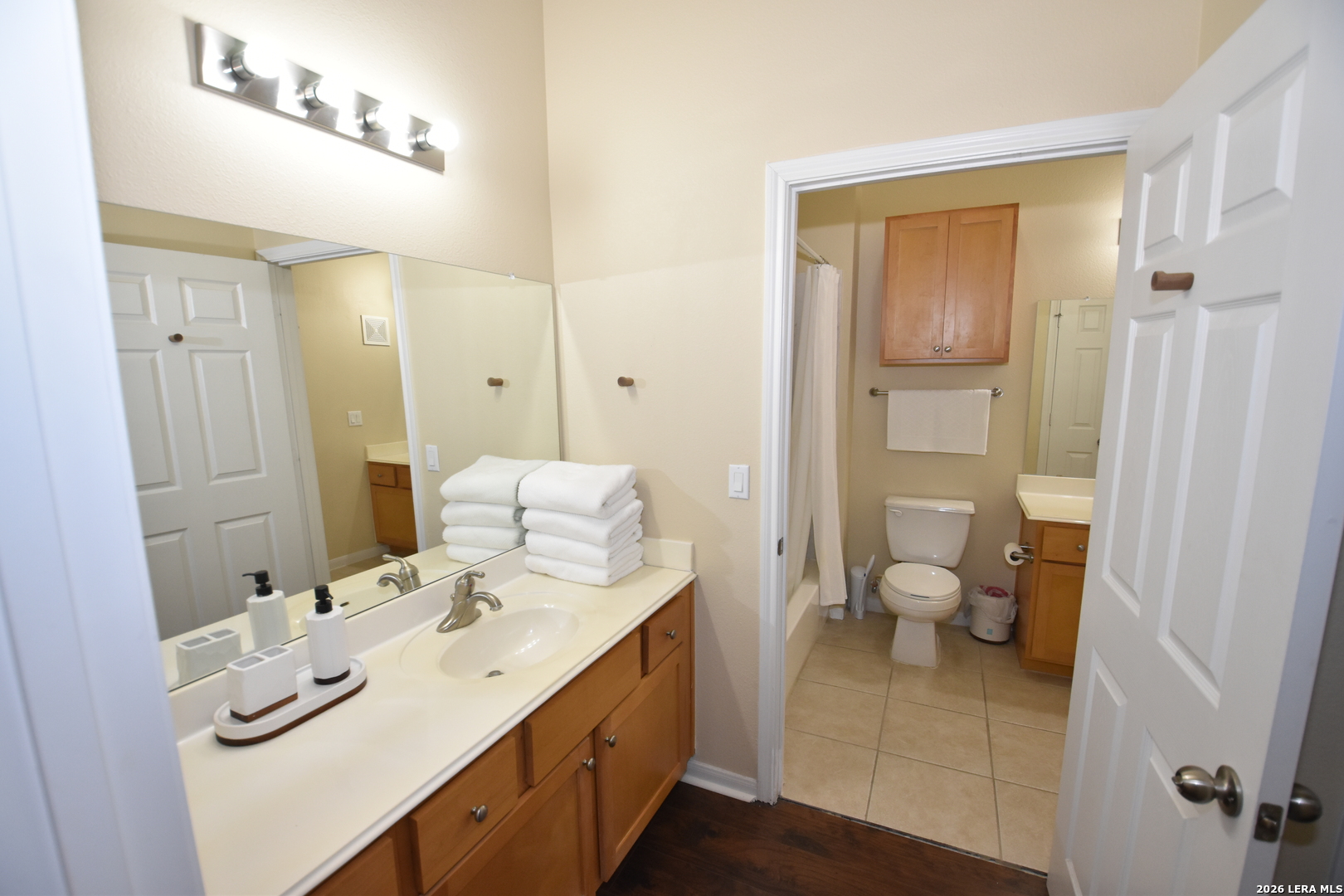 6160 Eckhert Road, Unit 804 San Antonio, TX 78240 - Photo 27 of 39 a spacious bathroom with a double vanity sink toilet and shower