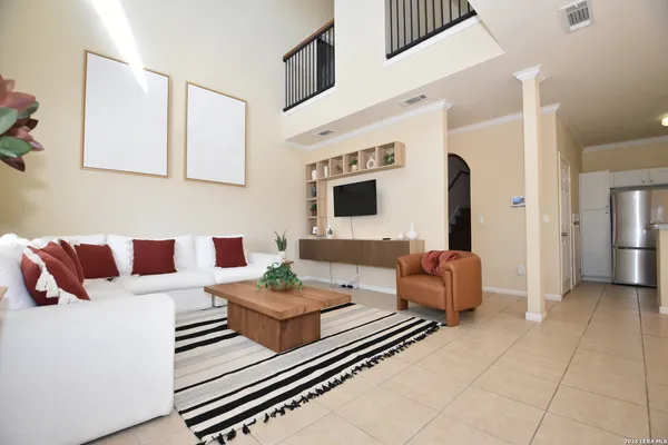 a living room with furniture and a table