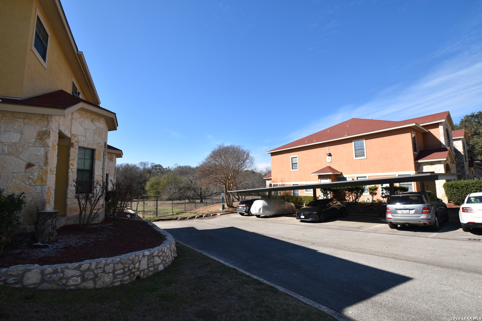 6160 Eckhert Road, Unit 804 San Antonio, TX 78240 - Photo 34 of 39 a view of building with car parked
