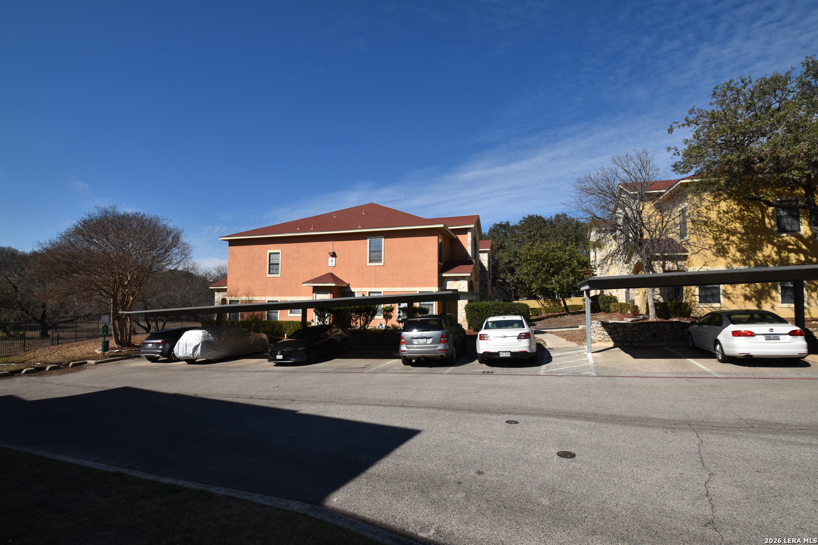 6160 Eckhert Road, Unit 804 San Antonio, TX 78240 - Photo 35 of 39 a view of a street with cars parked