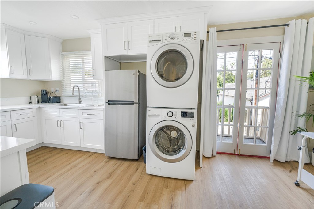 316 La France Avenue, Unit B Alhambra, CA 91801 - Photo 12 of 20 a view of a kitchen with washer and dryer