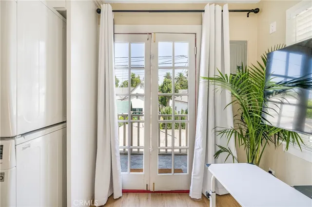 a view of a room with a potted plant