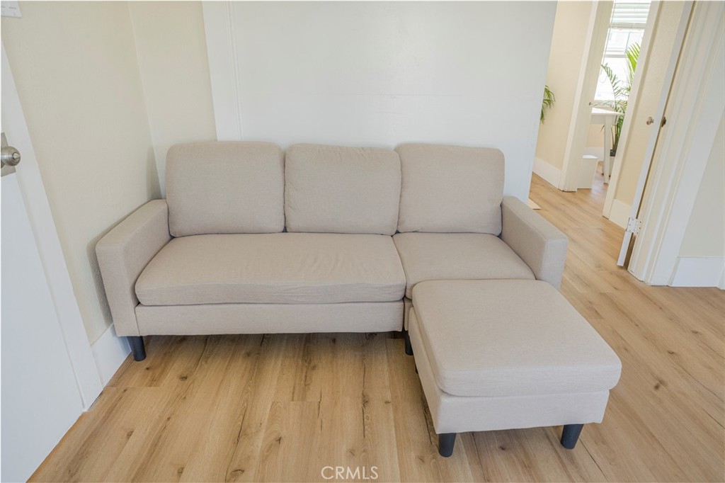 316 La France Avenue, Unit B Alhambra, CA 91801 - Photo 8 of 20 a living room with a couch and a rug
