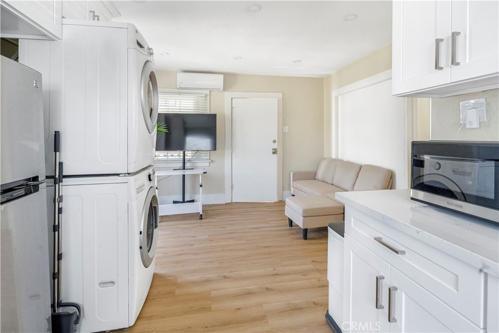316 La France Avenue, Unit B Alhambra, CA 91801 - Photo 10 of 20 a living room with furniture and a fireplace