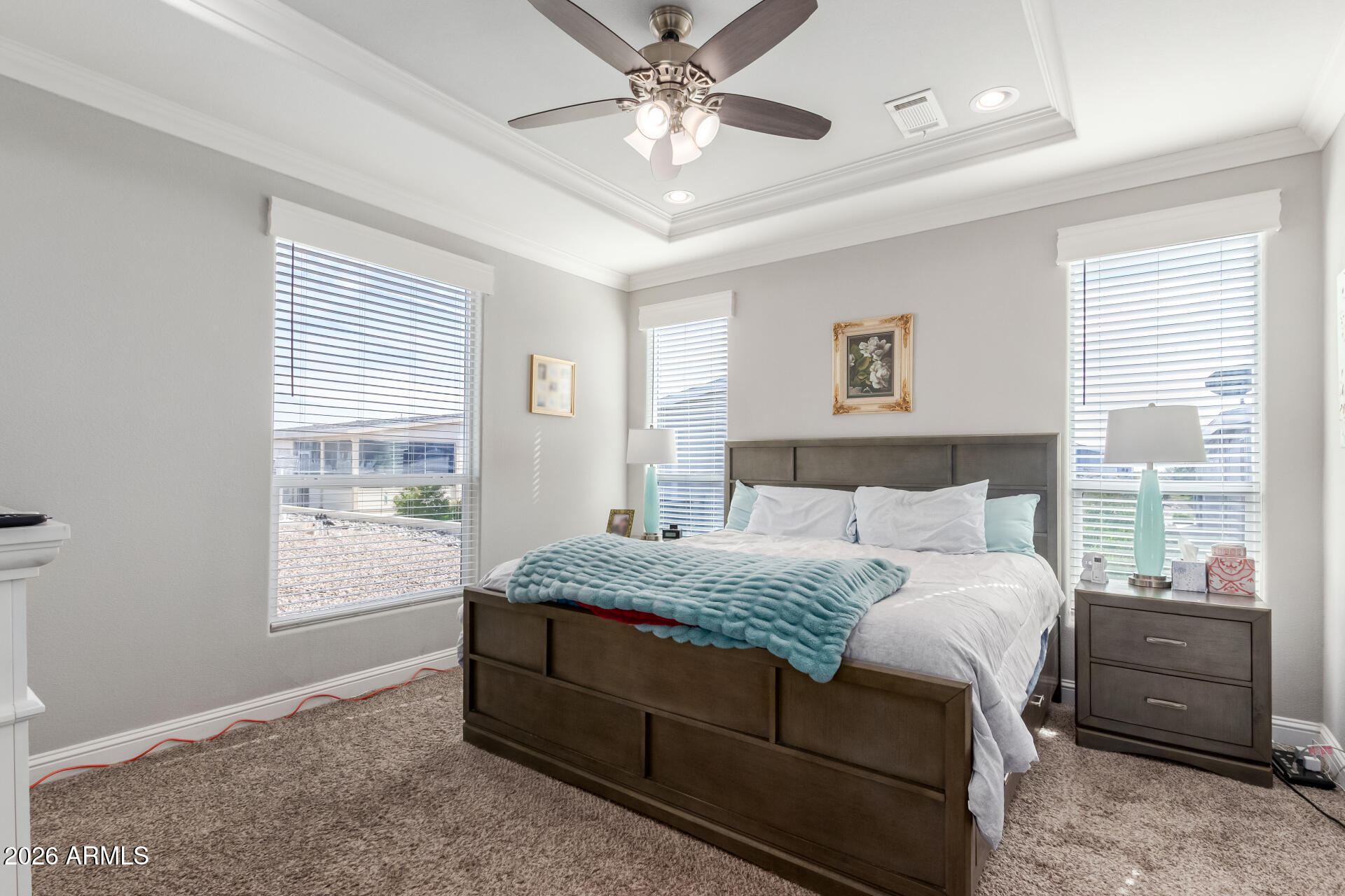 3301 South Goldfield Road, Unit 6031 Apache Junction, AZ 85119 - Photo 19 of 34 a bedroom with a bed and a window