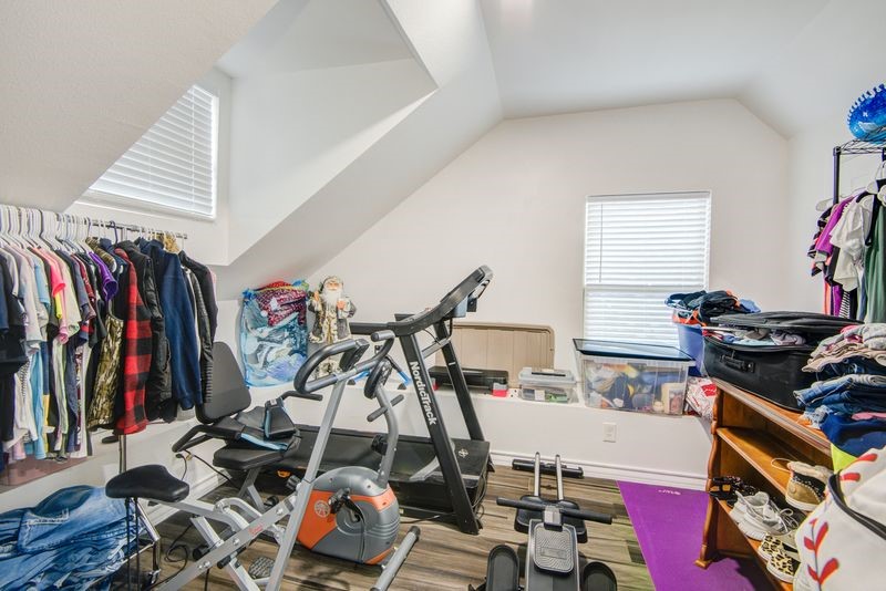 1256 2nd Street Clute, TX 77531 - Photo 28 of 43 a view of a room with gym equipment