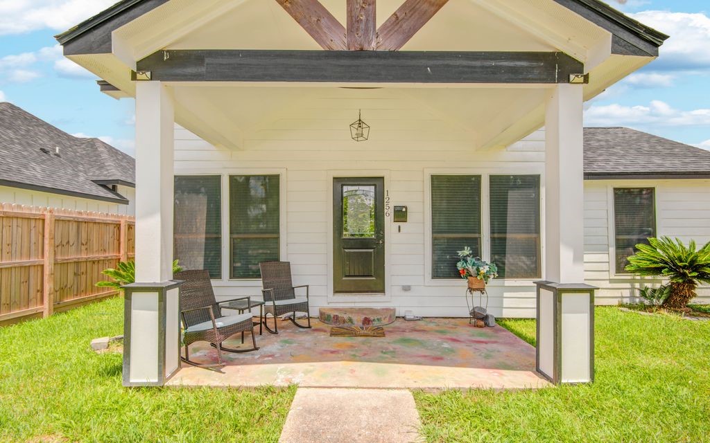 1256 2nd Street Clute, TX 77531 - Photo 3 of 43 a view of a house with backyard and porch