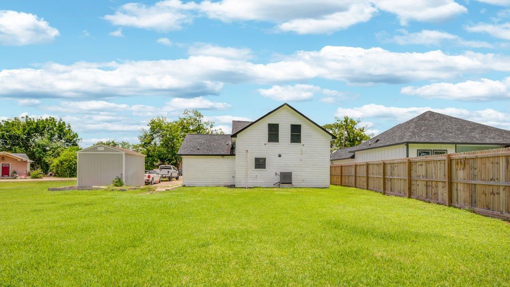 1256 2nd Street Clute, TX 77531 - Photo 38 of 43 a view of a house with a yard and sitting area