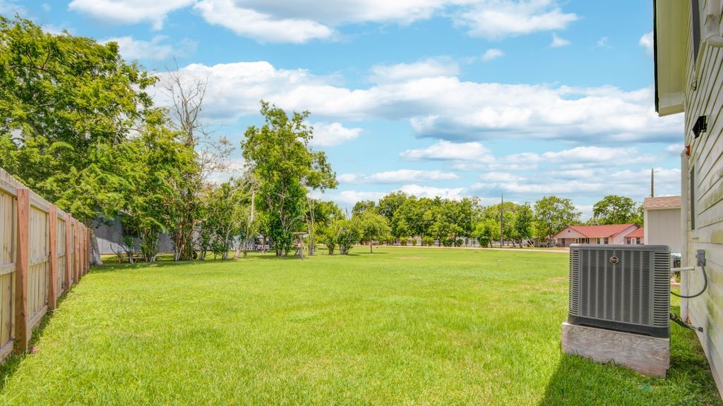 1256 2nd Street Clute, TX 77531 - Photo 40 of 43 a view of a yard with a house