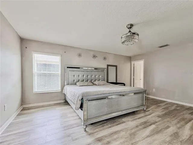 a bathroom sink with a granite countertop