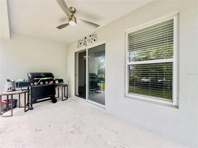 a aerial view of a house with a yard and plants