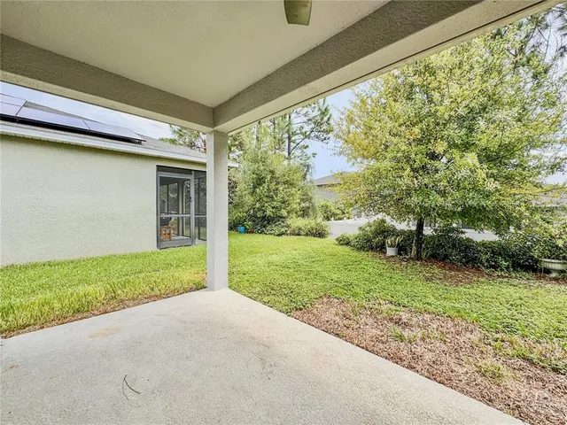 an aerial view of a city and lake view