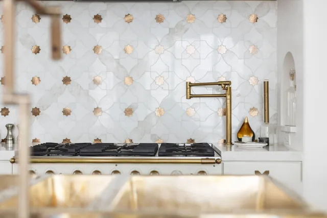 a bathroom with a double vanity sink mirror and bathtub