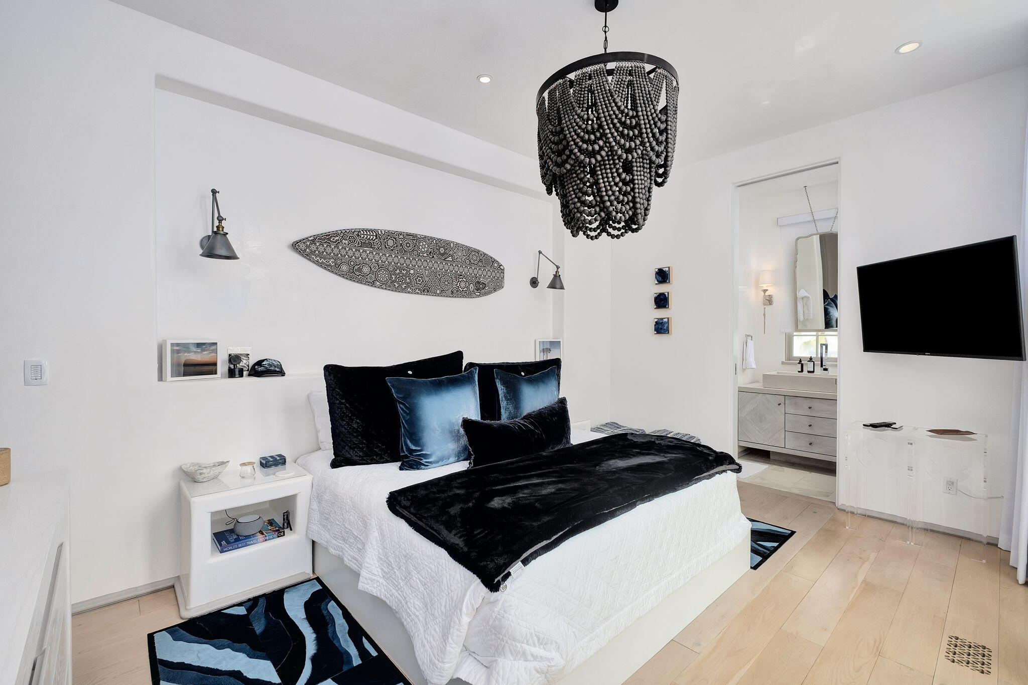 38 Shinbone Court Alys Beach, FL 32461 - Photo 18 of 23 a kitchen with a stove a refrigerator and a white cabinets