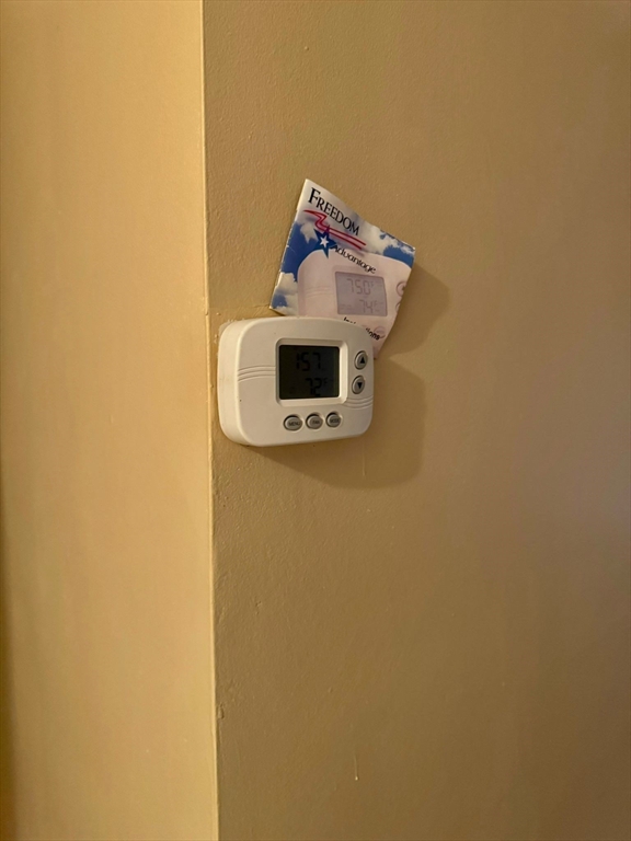 32 Whites Avenue, Unit E112 Watertown, MA 02472 - Photo 30 of 41 a picture of a door and a microwave