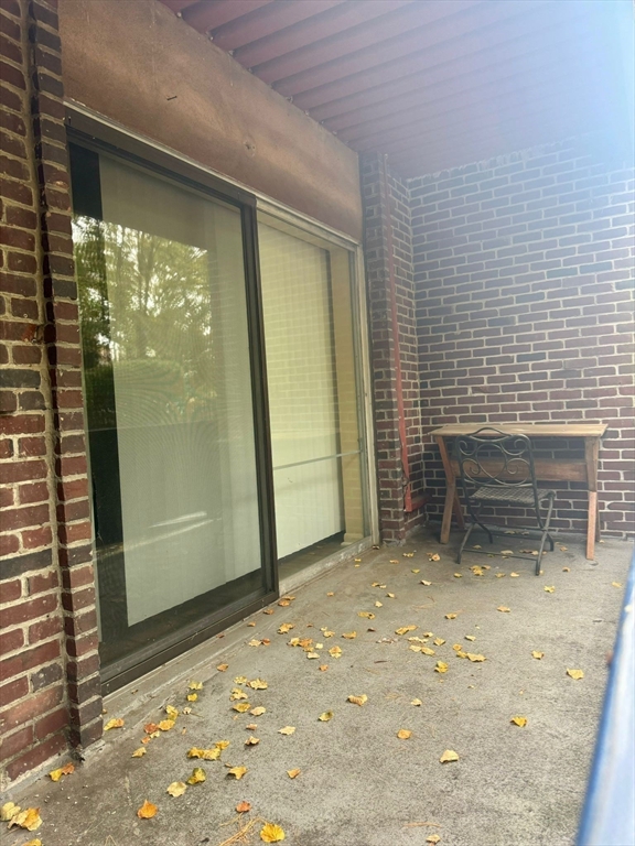 32 Whites Avenue, Unit E112 Watertown, MA 02472 - Photo 32 of 41 a view of backyard with garden