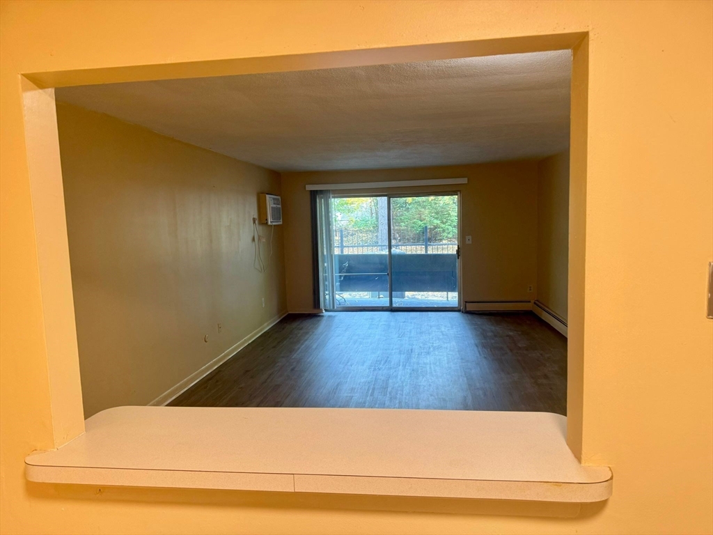 32 Whites Avenue, Unit E112 Watertown, MA 02472 - Photo 4 of 41 a view of wooden floor