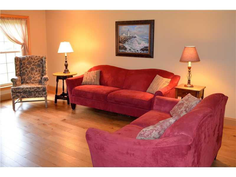 335 Old Orchard Road Buxton, ME 04093 - Photo 10 of 32 Living Room. Front to back living...