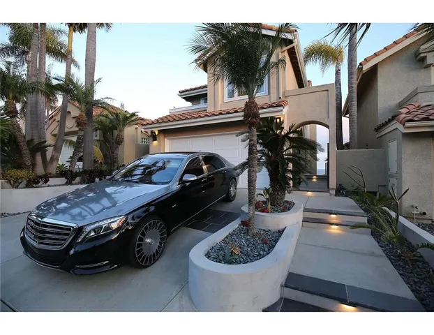 a front view of a house with balcony