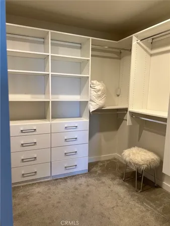 a room with a furniture and a table