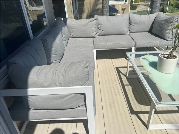 a living room with furniture and a couch