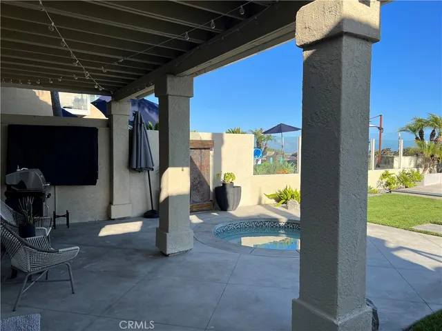 a view of multiple houses with a street