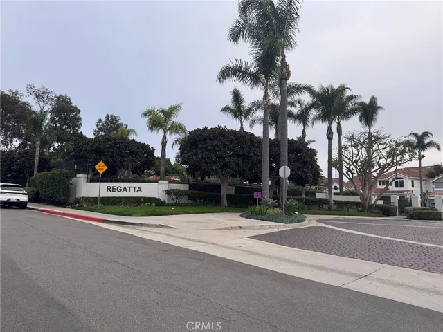 a view of car parked in front of a building