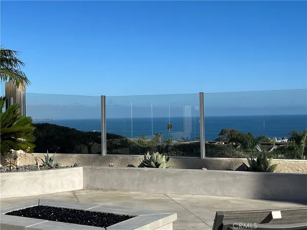 a view of a terrace with sitting area