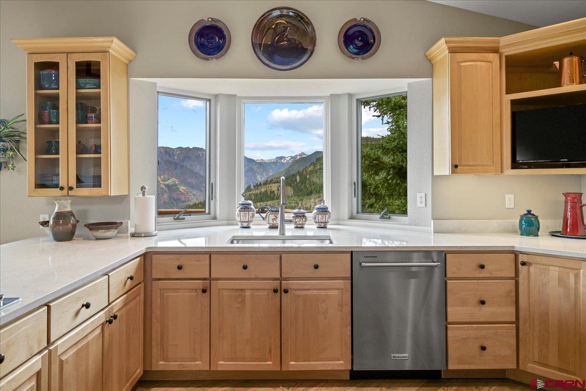 1600 Elk Ridge Trail Ridgway, CO 81432 - Photo 13 of 43 a kitchen with cabinets and window