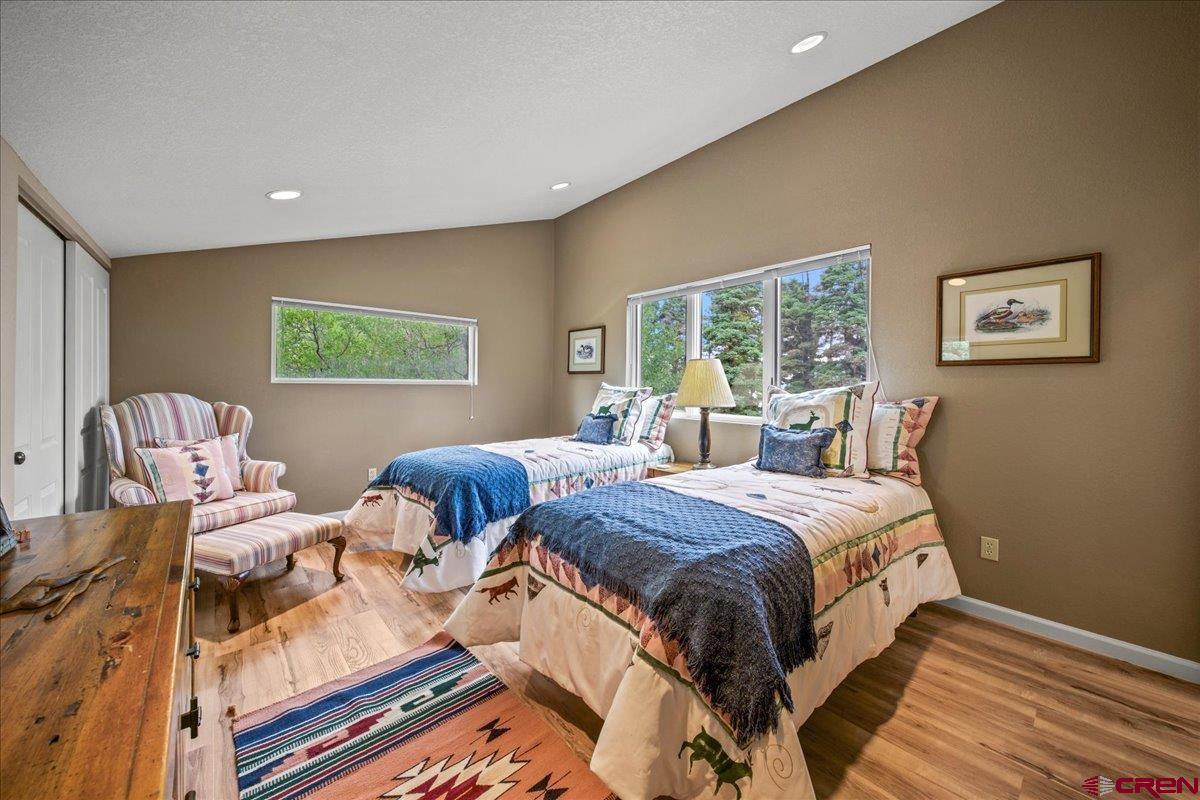 1600 Elk Ridge Trail Ridgway, CO 81432 - Photo 23 of 43 a bedroom with two beds and a dresser