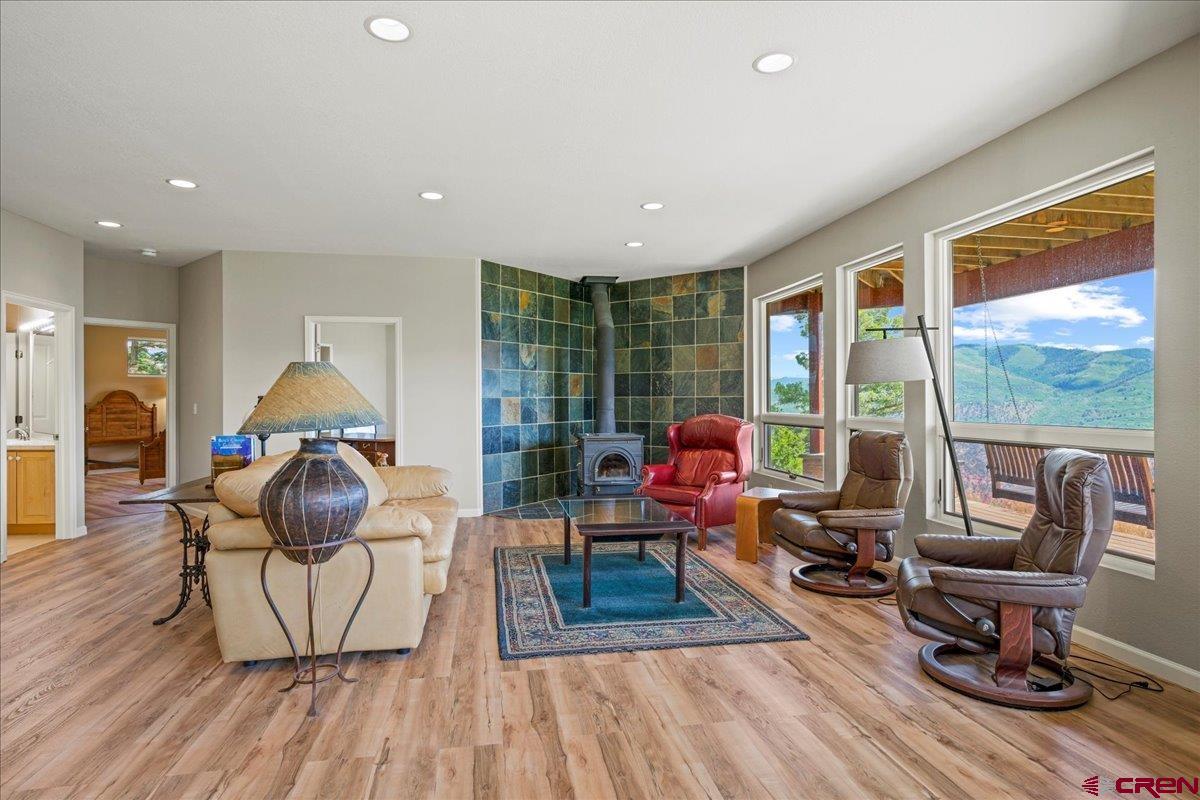 1600 Elk Ridge Trail Ridgway, CO 81432 - Photo 28 of 43 a living room with furniture and a large window