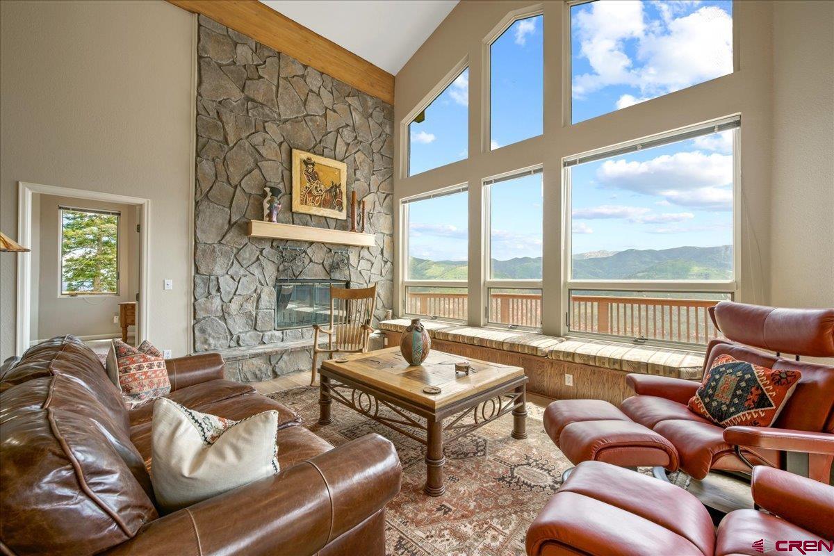 1600 Elk Ridge Trail Ridgway, CO 81432 - Photo 7 of 43 a living room with furniture and a large window