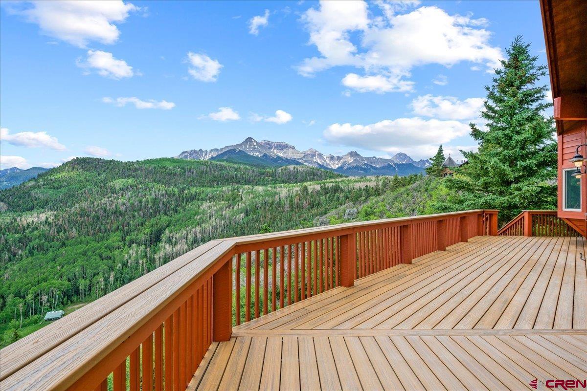 1600 Elk Ridge Trail Ridgway, CO 81432 - Photo 10 of 43 a balcony with wooden floor and city view