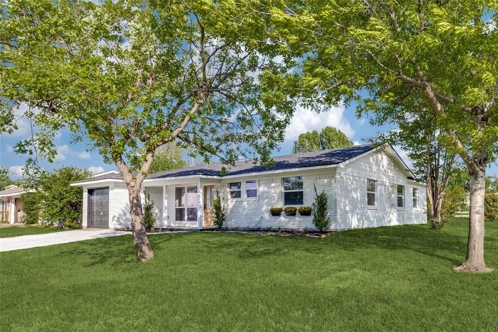 14234 Queens Chapel Road Farmers Branch, TX 75234 - Photo 2 of 21 front view of house with a yard