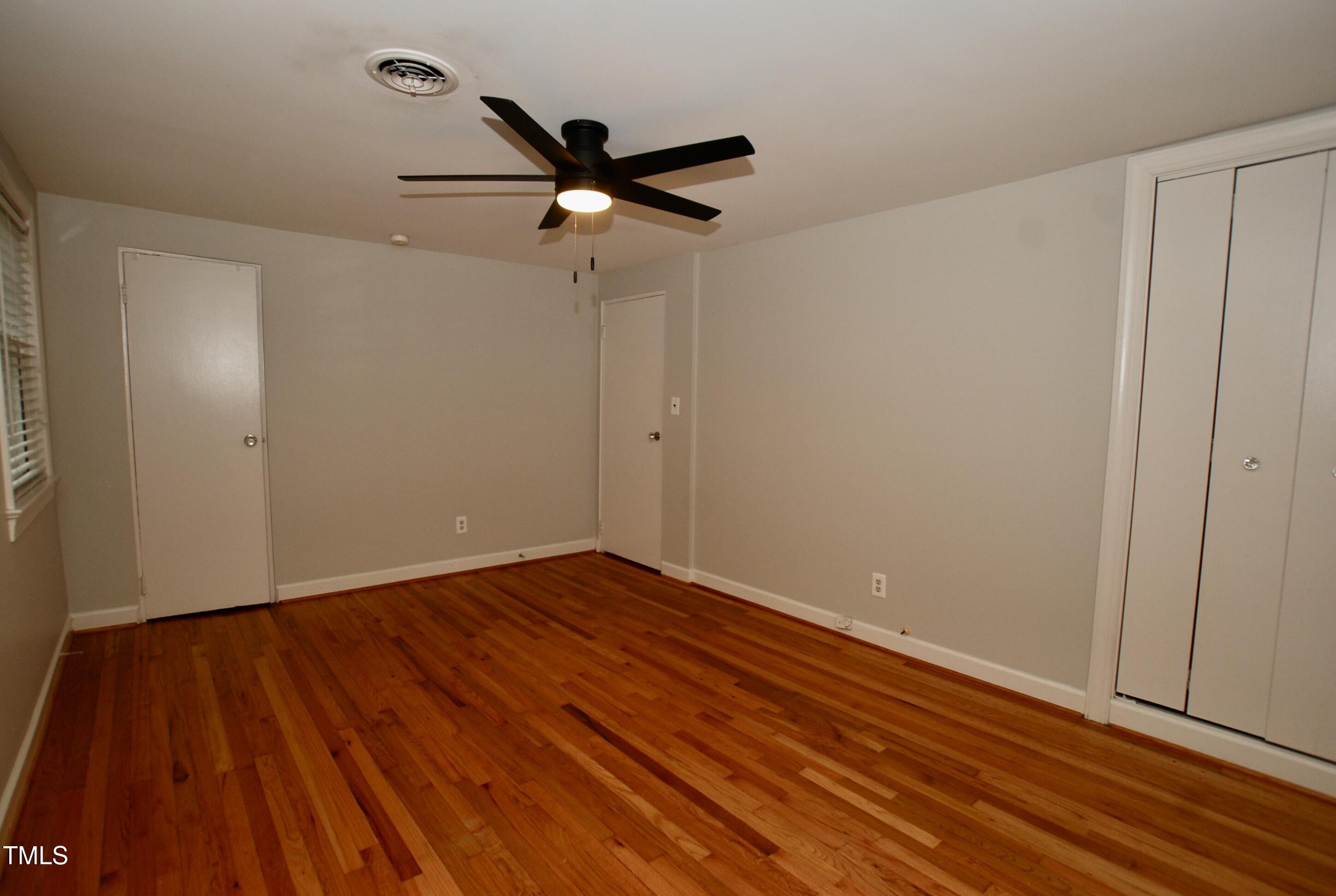 1908 Smallwood Drive Raleigh, NC 27605 - Photo 12 of 30 wooden floor in an empty room