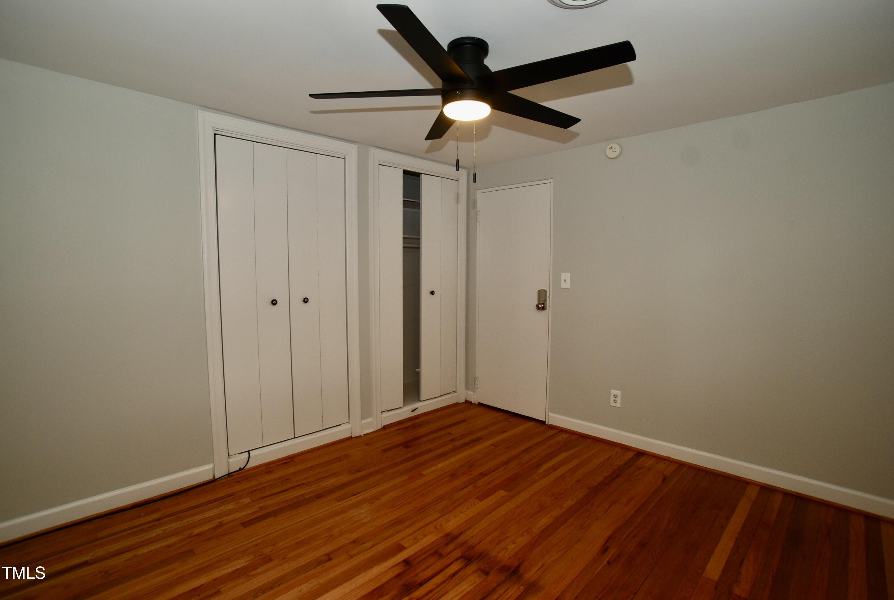 1908 Smallwood Drive Raleigh, NC 27605 - Photo 13 of 30 wooden floor in an empty room