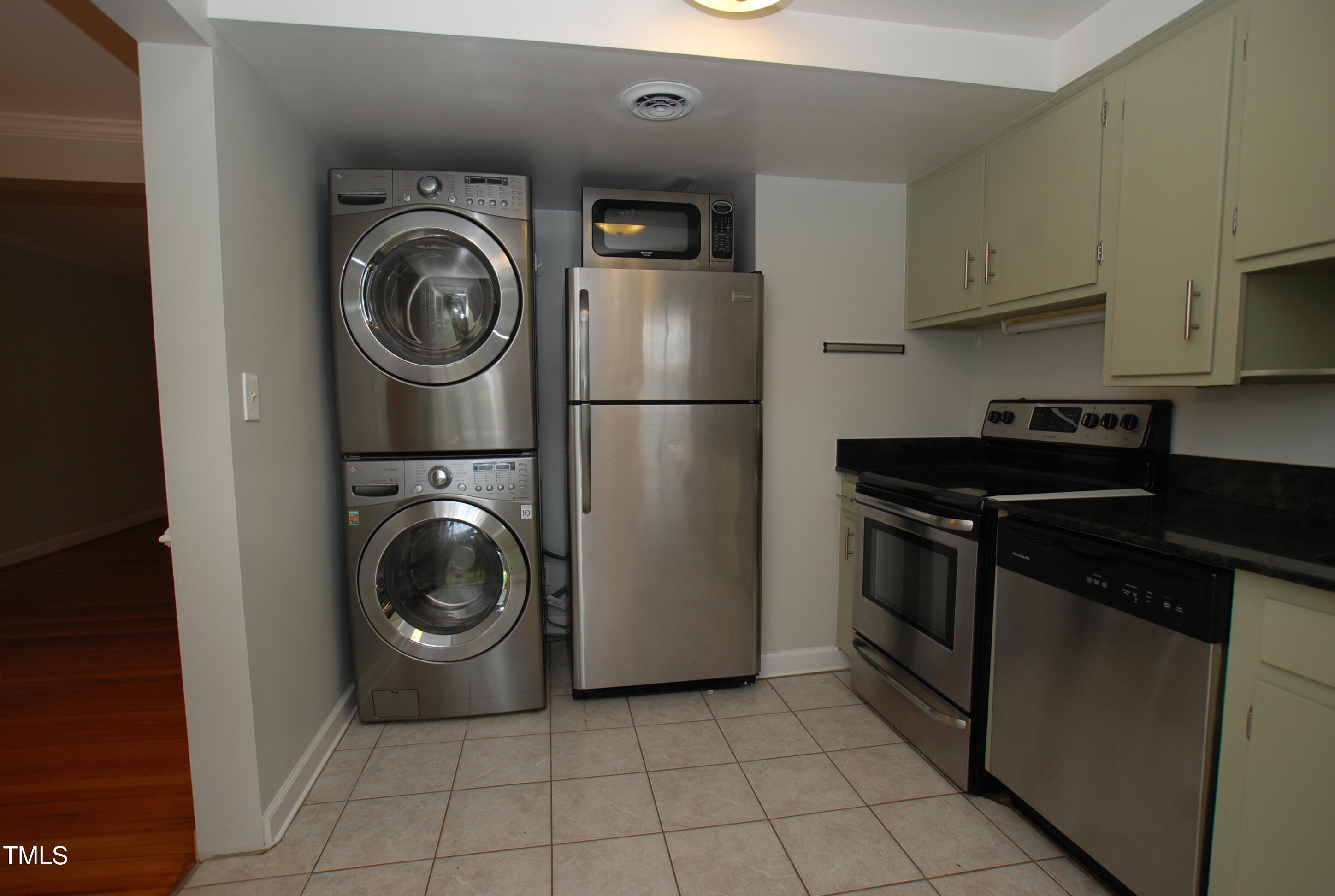 1908 Smallwood Drive Raleigh, NC 27605 - Photo 7 of 30 a utility room with sink dryer and washer
