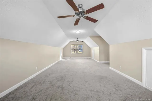 a view of a garage with racks on the wall