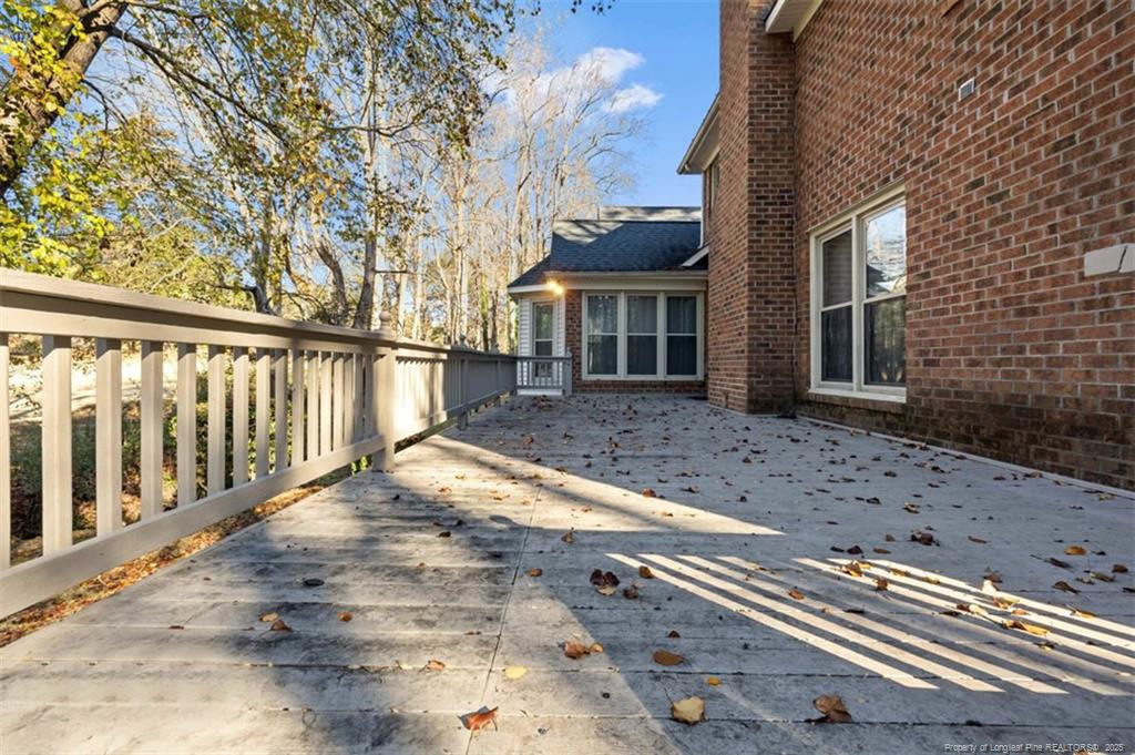 6922 South Staff Road Fayetteville, NC 28306 - Photo 36 of 45 a view of a house with a yard