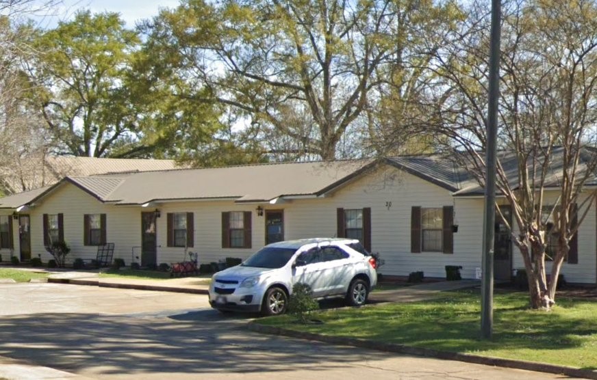 11 Hillcross Street Other, AL 36456 - Photo 4 of 6 a white house that has a tree in front of it