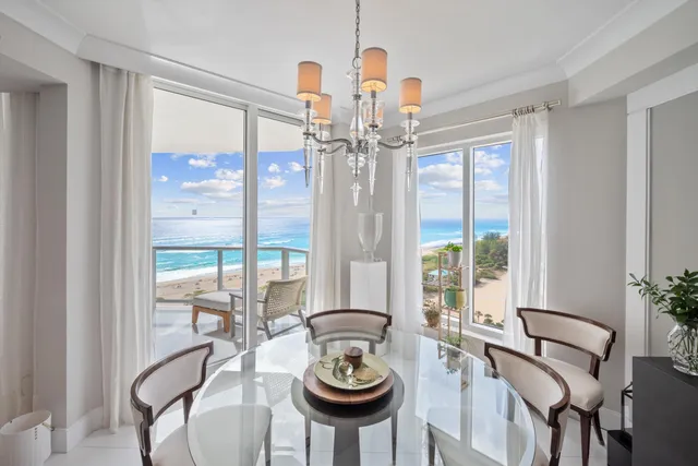 a view of a dining room with furniture window and outside view