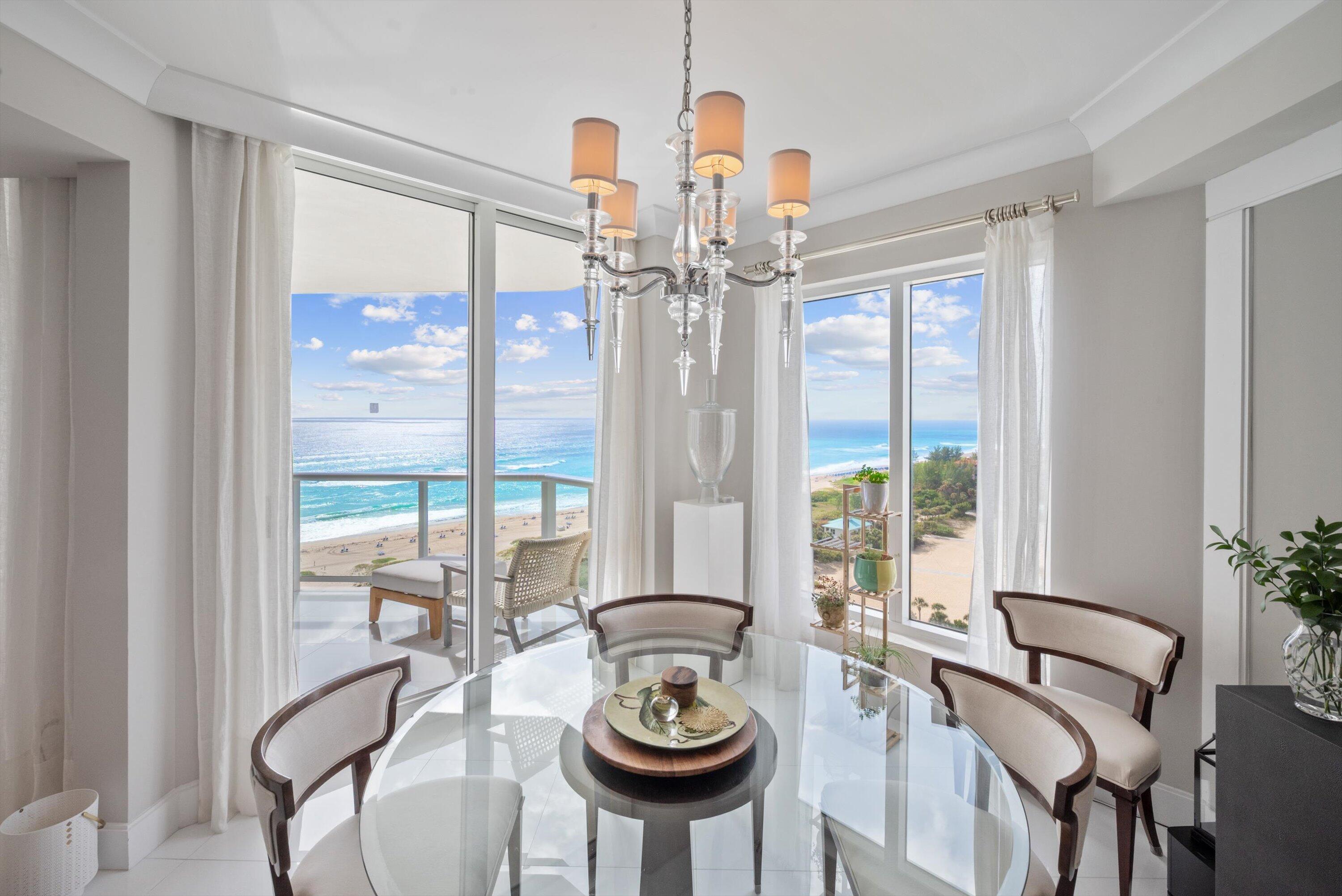 2700 North Ocean Drive, Unit 1401B Singer Island, FL 33404 - Photo 17 of 49 a view of a dining room with furniture window and outside view