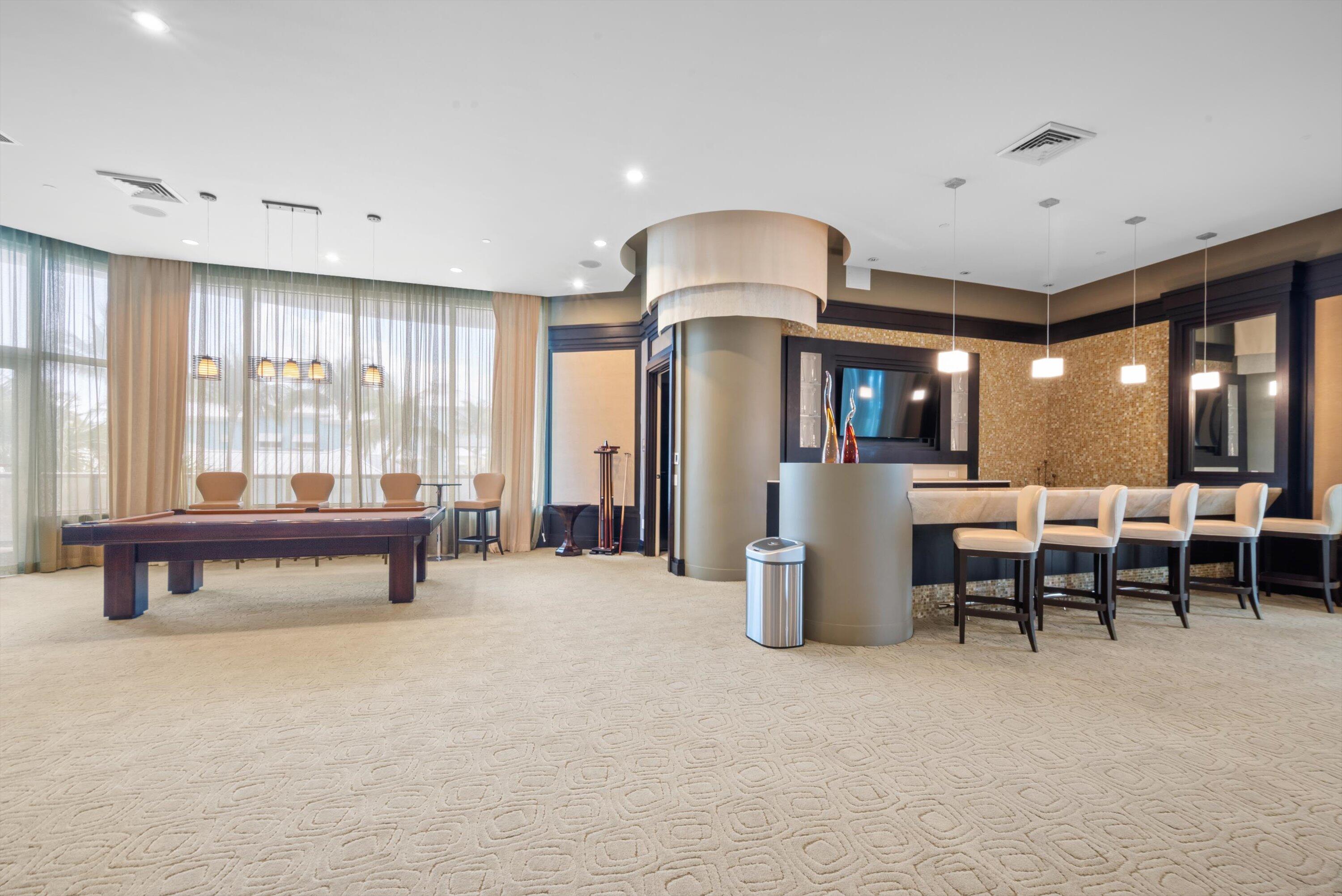 2700 North Ocean Drive, Unit 1401B Singer Island, FL 33404 - Photo 39 of 49 a living room with furniture and a large window